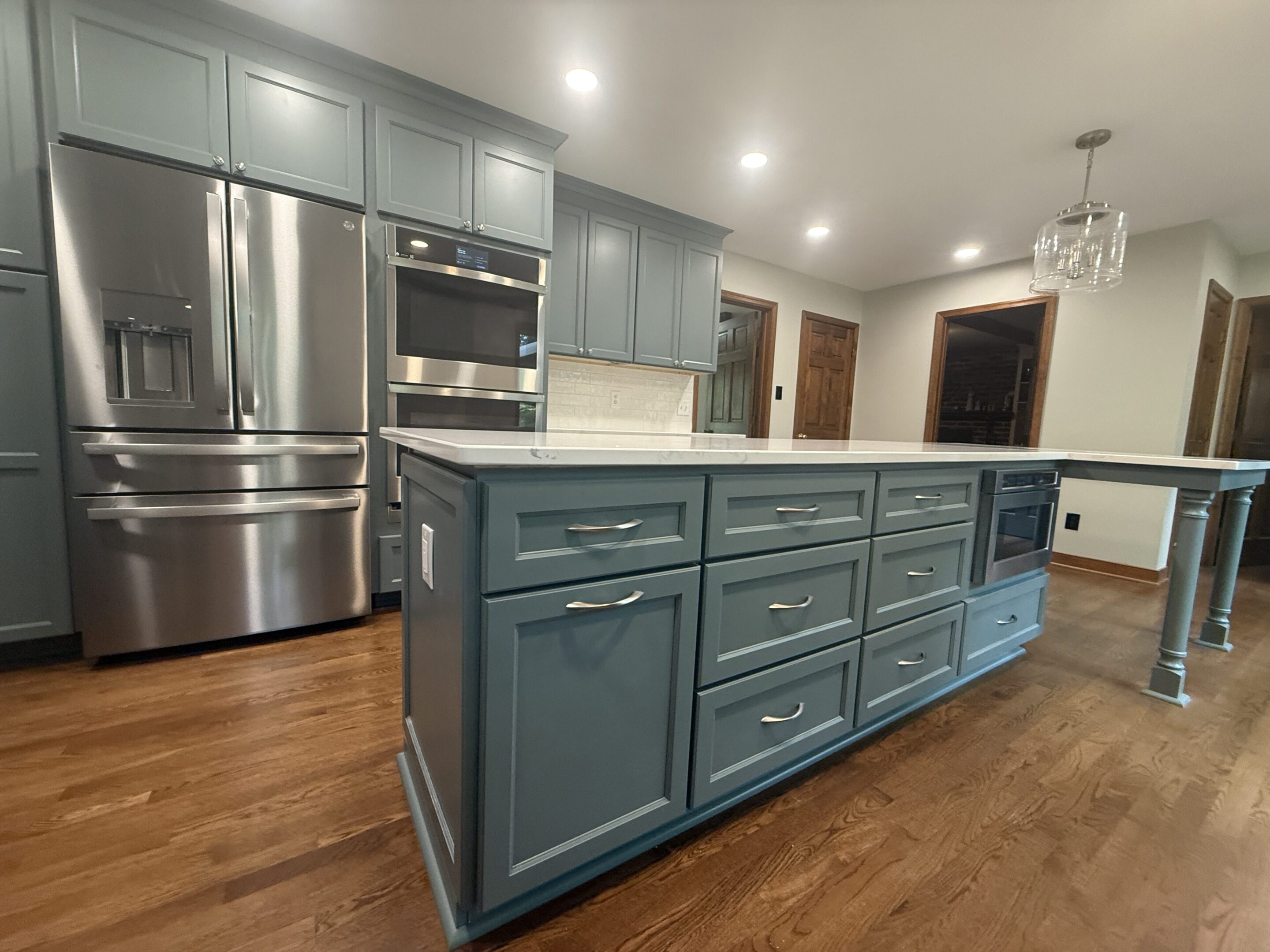 Painted blue cabinets and white countertop
