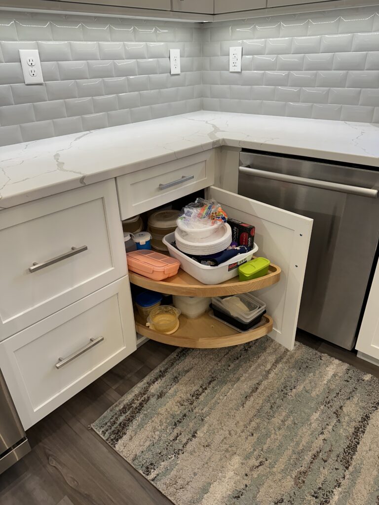 Kitchen corner cabinet with rotating shelves.