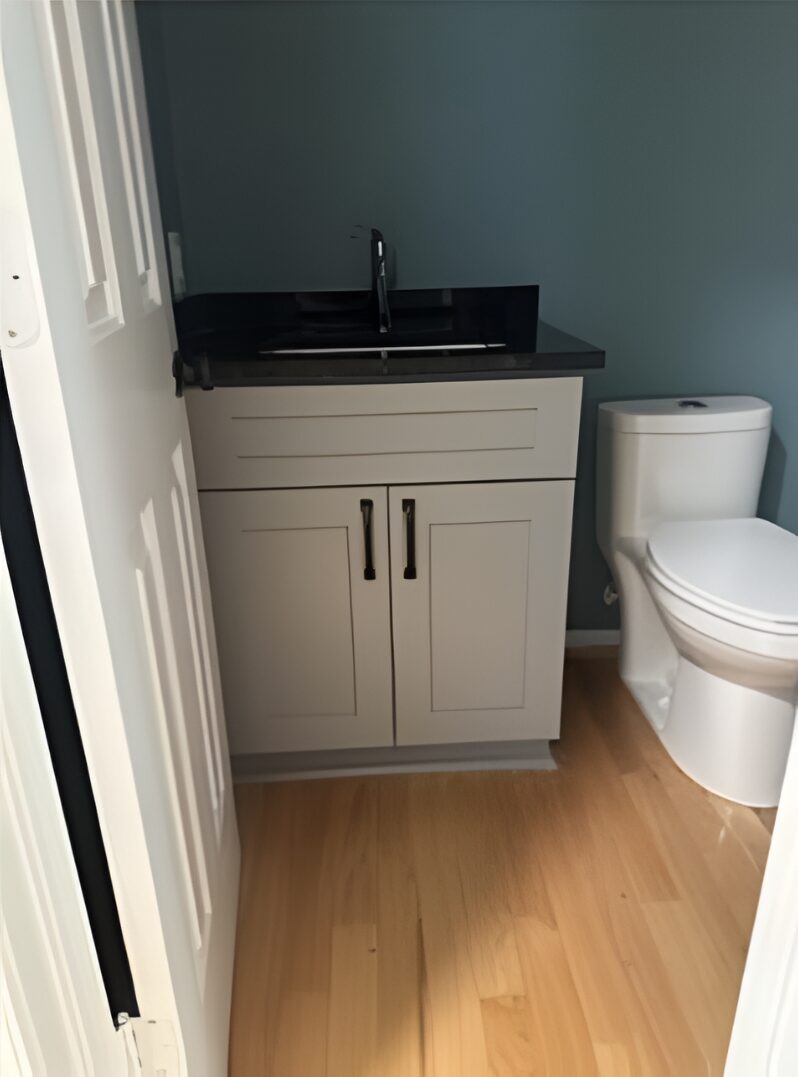 Small bathroom with vanity and toilet